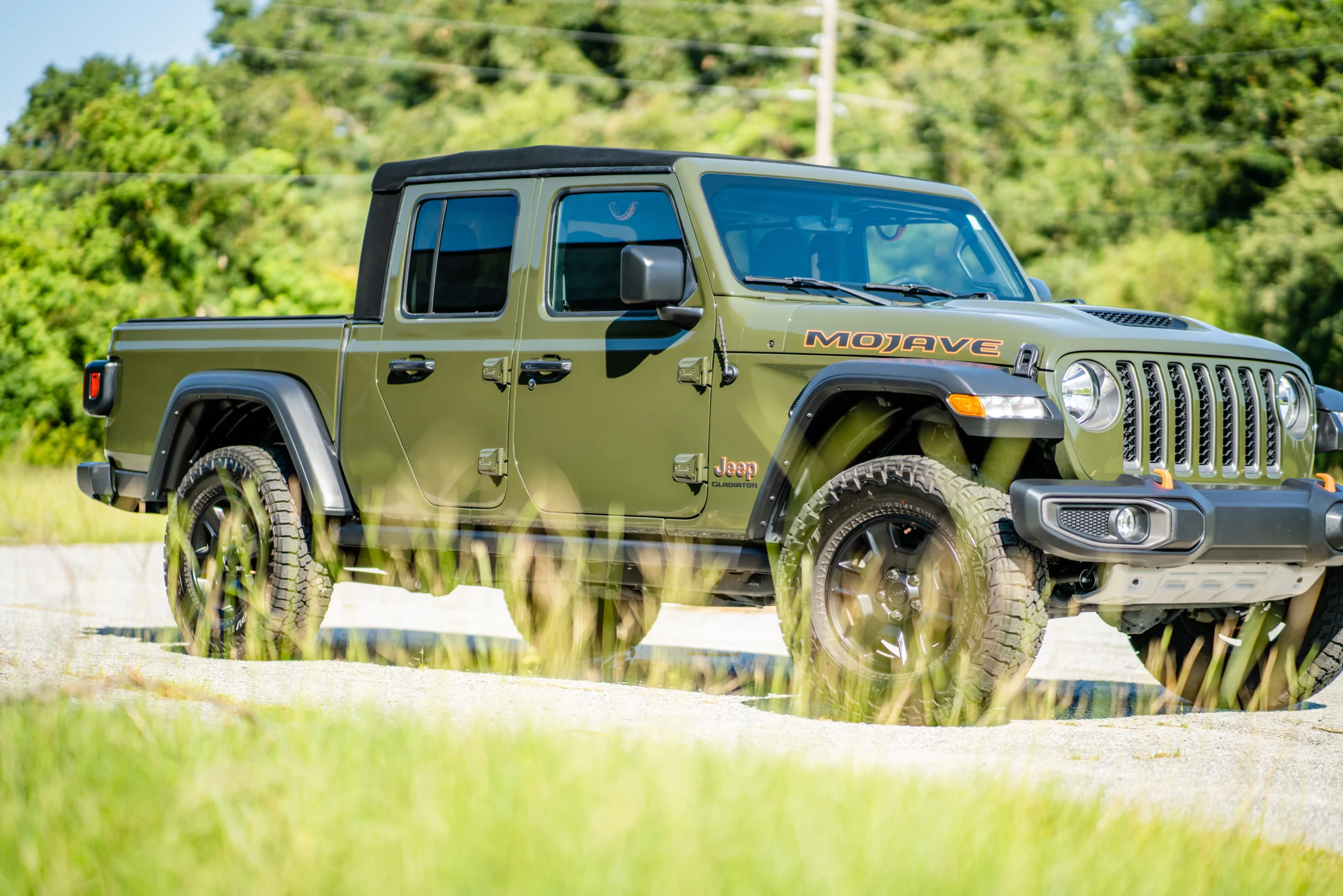 A jeep with a stellar ceramic coating parked on the side of the road in Hilton Head.
