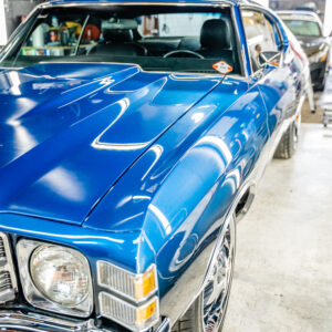 Beautiful blue car with a freshly applied, shiny layer of ceramic coating