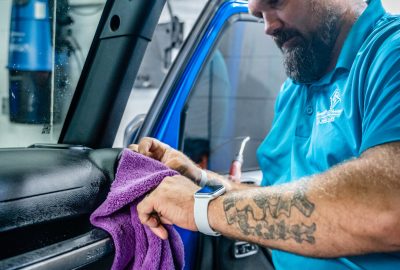 Brian from Summer Breeze Ceramic Coating & Mobile Detailing loves meticulous car interior detailing, ensuring every nook and cranny is spotless.